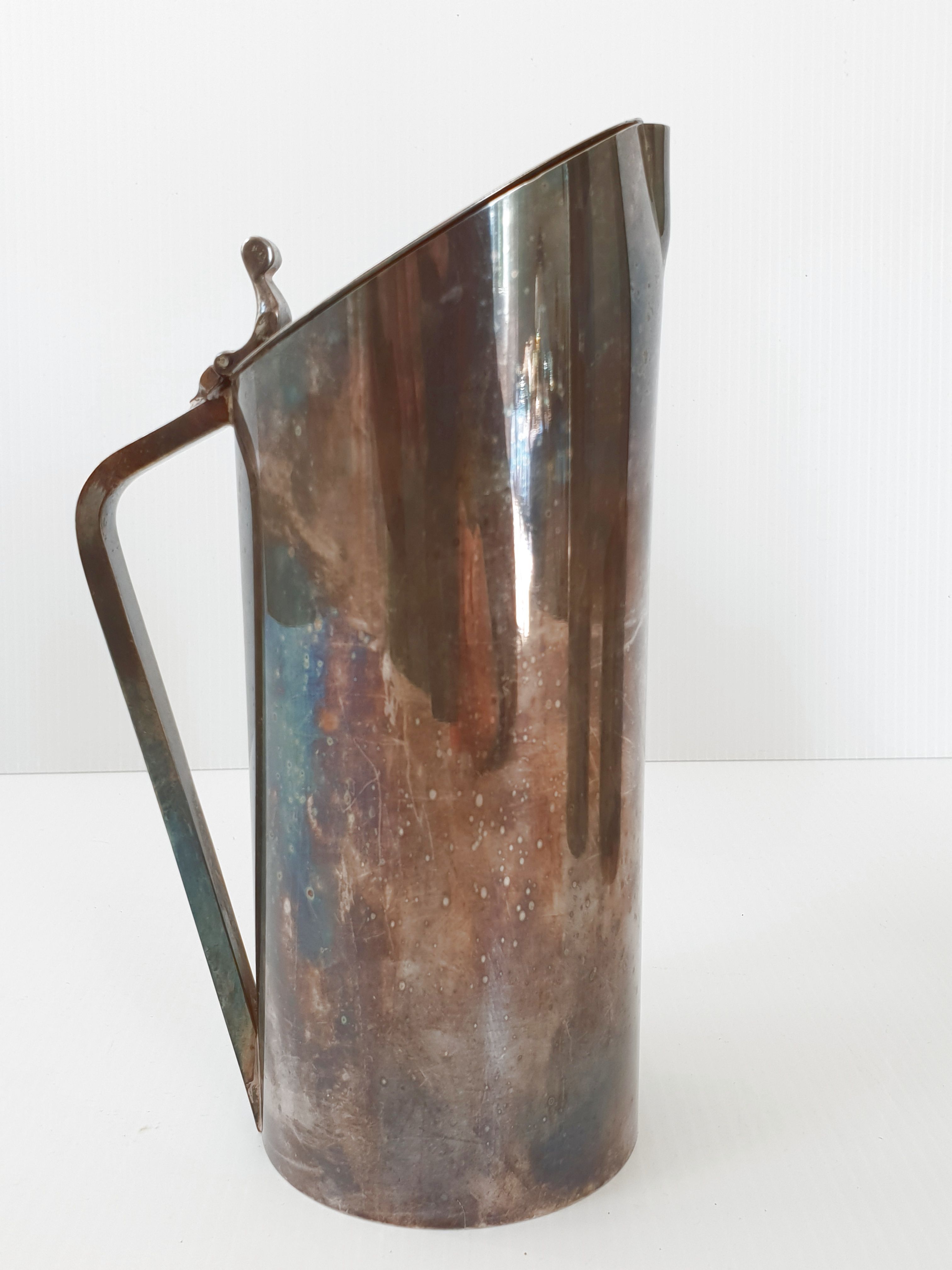 Suite of 3 pitchers in vintage 1970 silver metal