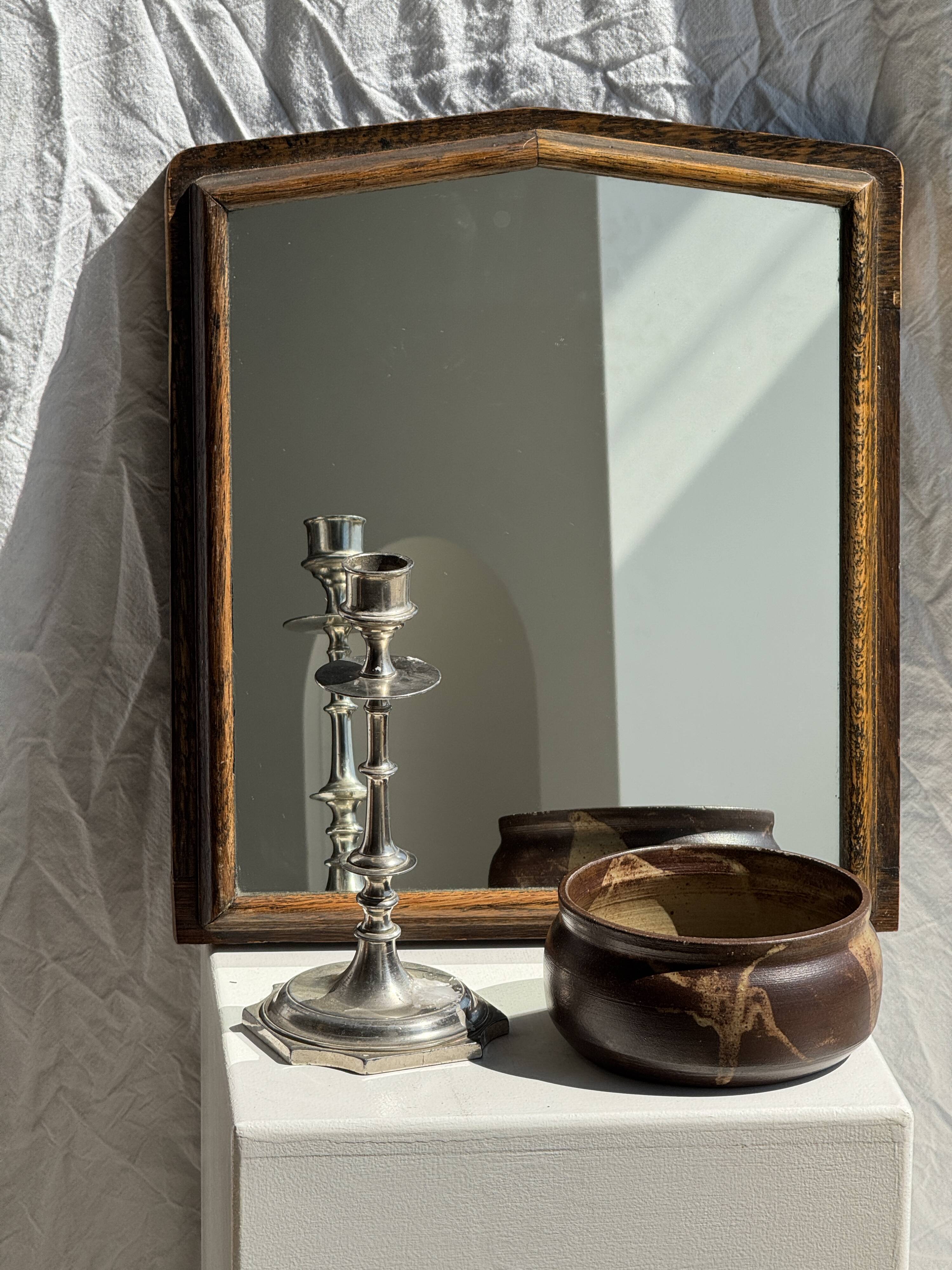 Small antique English rectangular mirror with pediment and oak frame