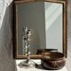 Small antique English rectangular mirror with pediment and oak frame
