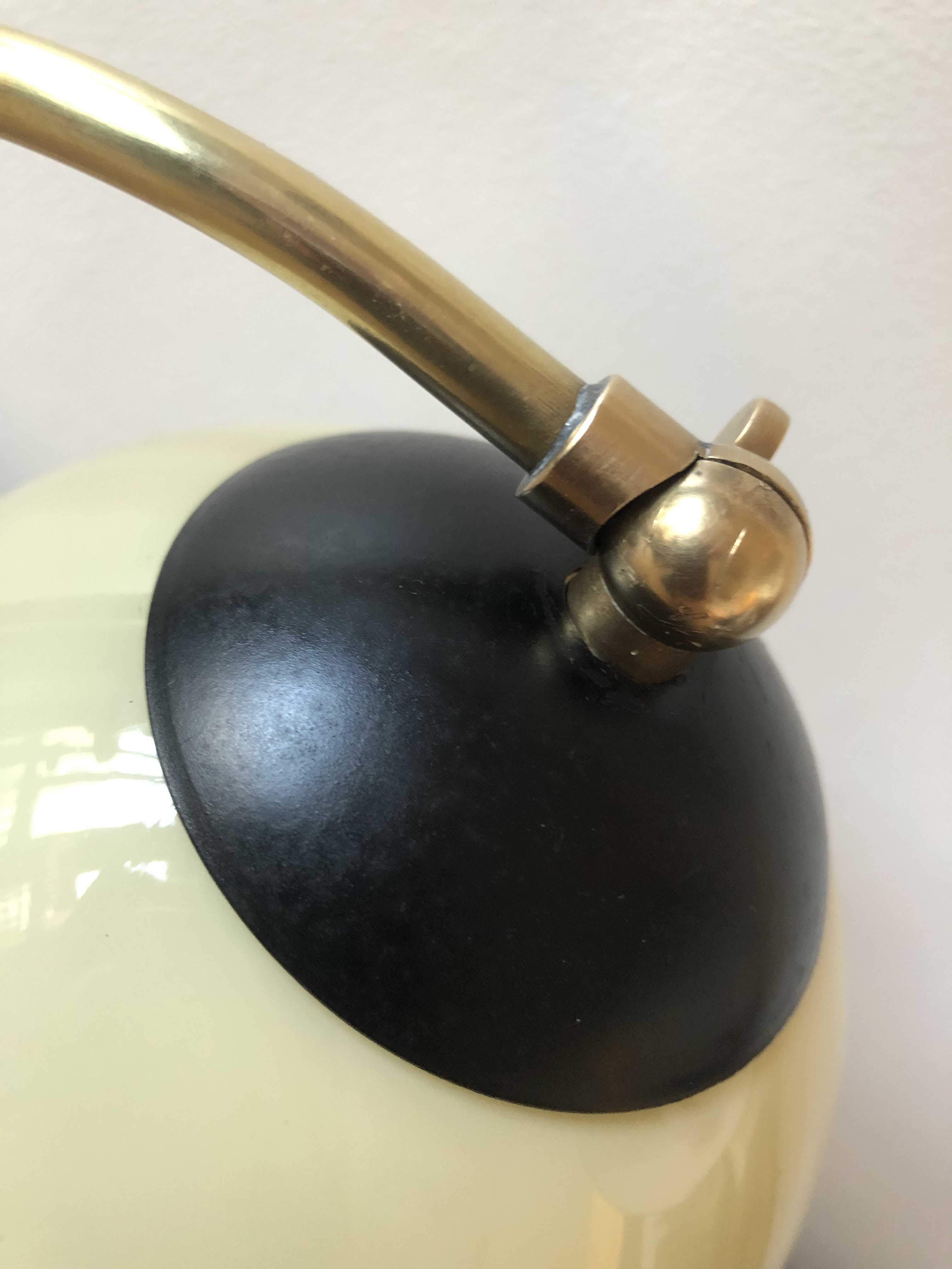 Old lamp articulated with opaline