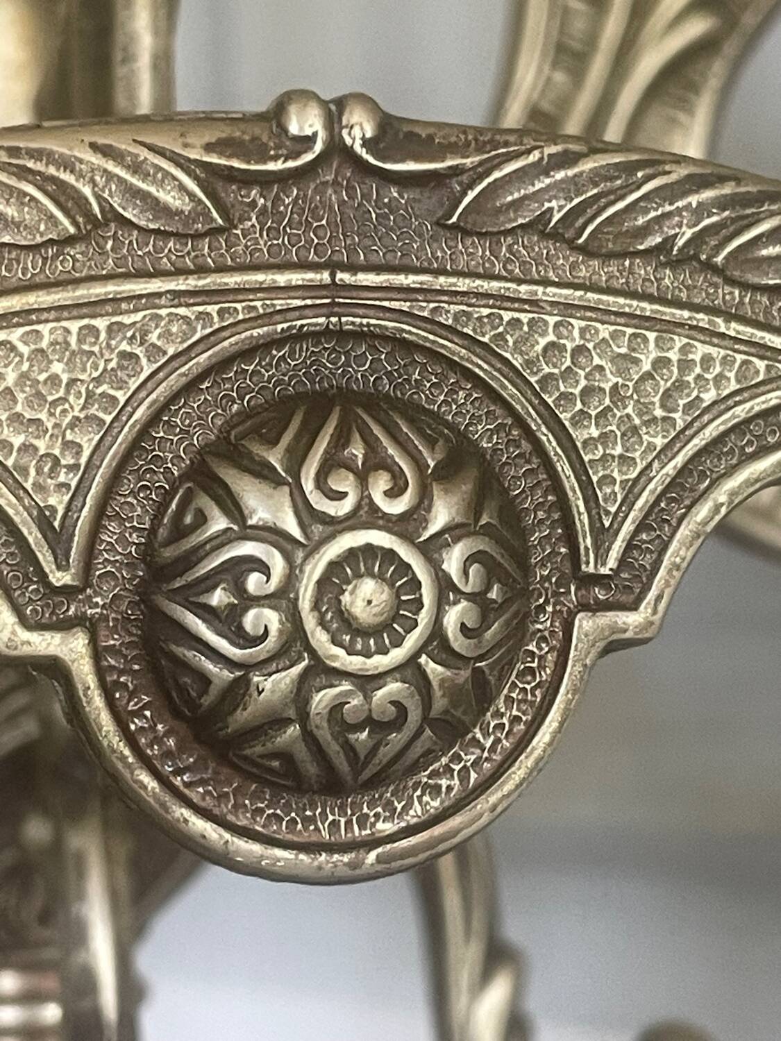 Freestanding brass coat rack