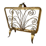 Vintage wrought iron magazine rack with gold butterfly design