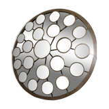 Mirror with round facets design