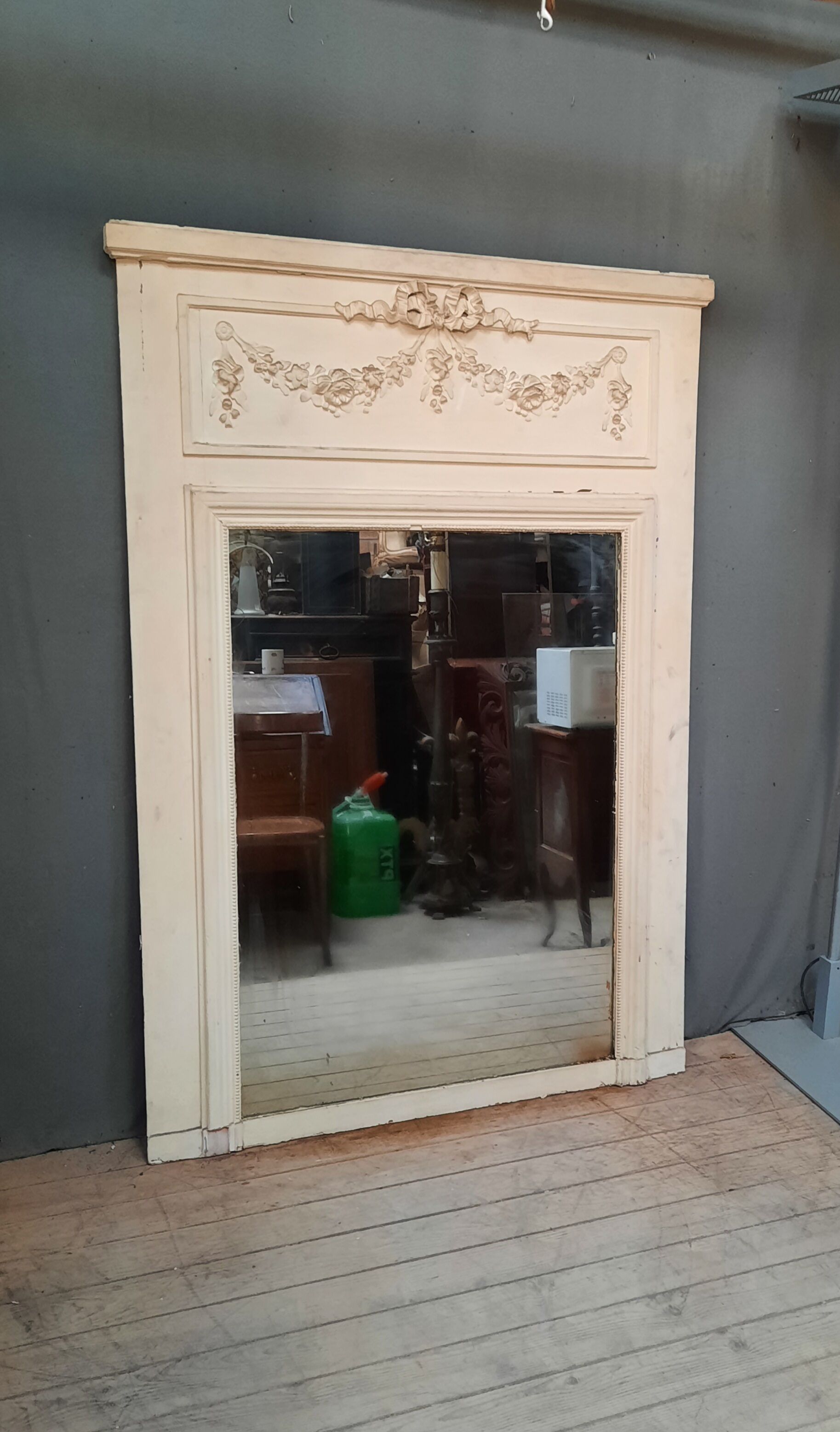 White painted wood paneling mirror