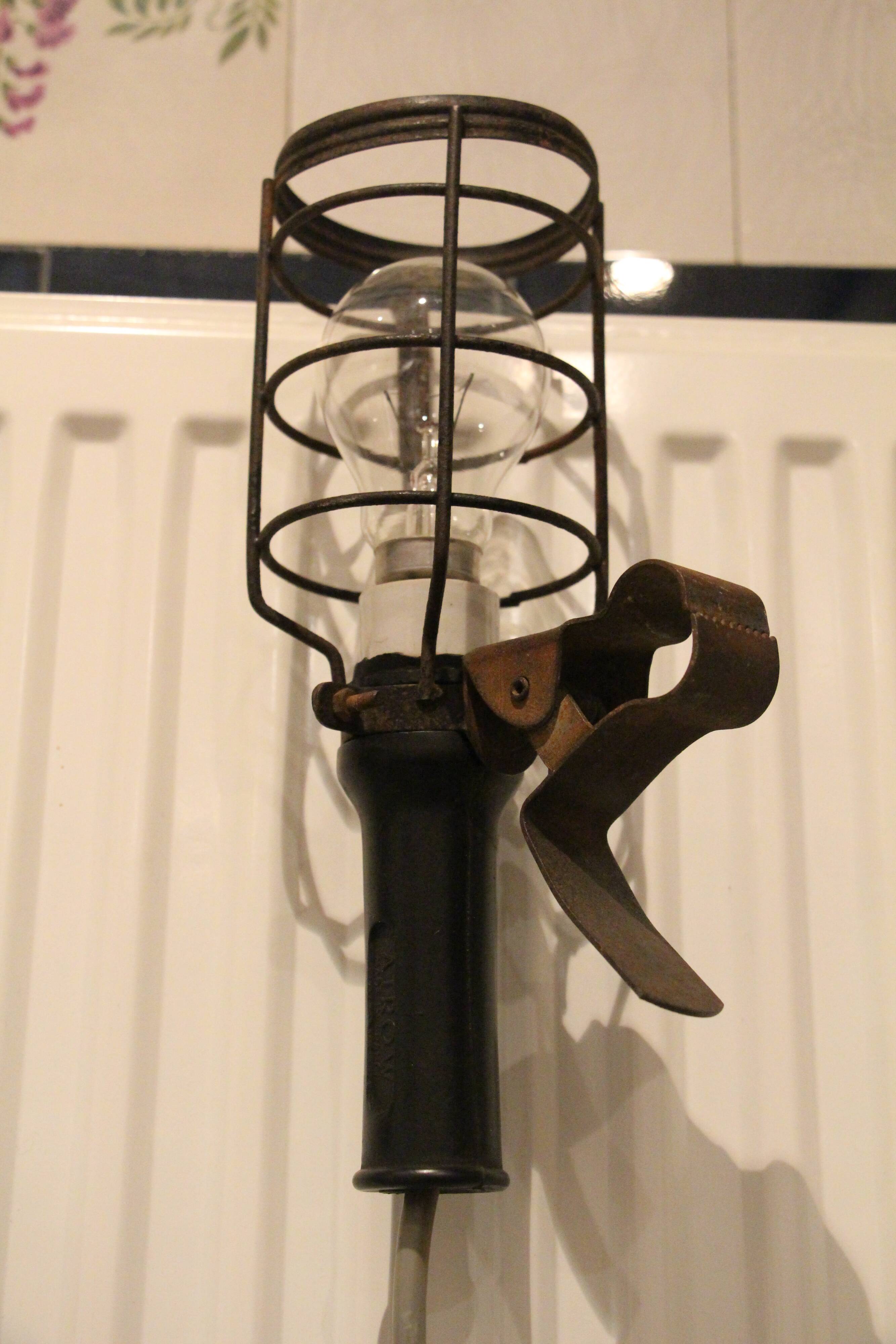 Old atrow walking lamp