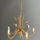 Golden Metal Chandelier with Reed Bouquet Decoration. Coco Chanel Style. Work