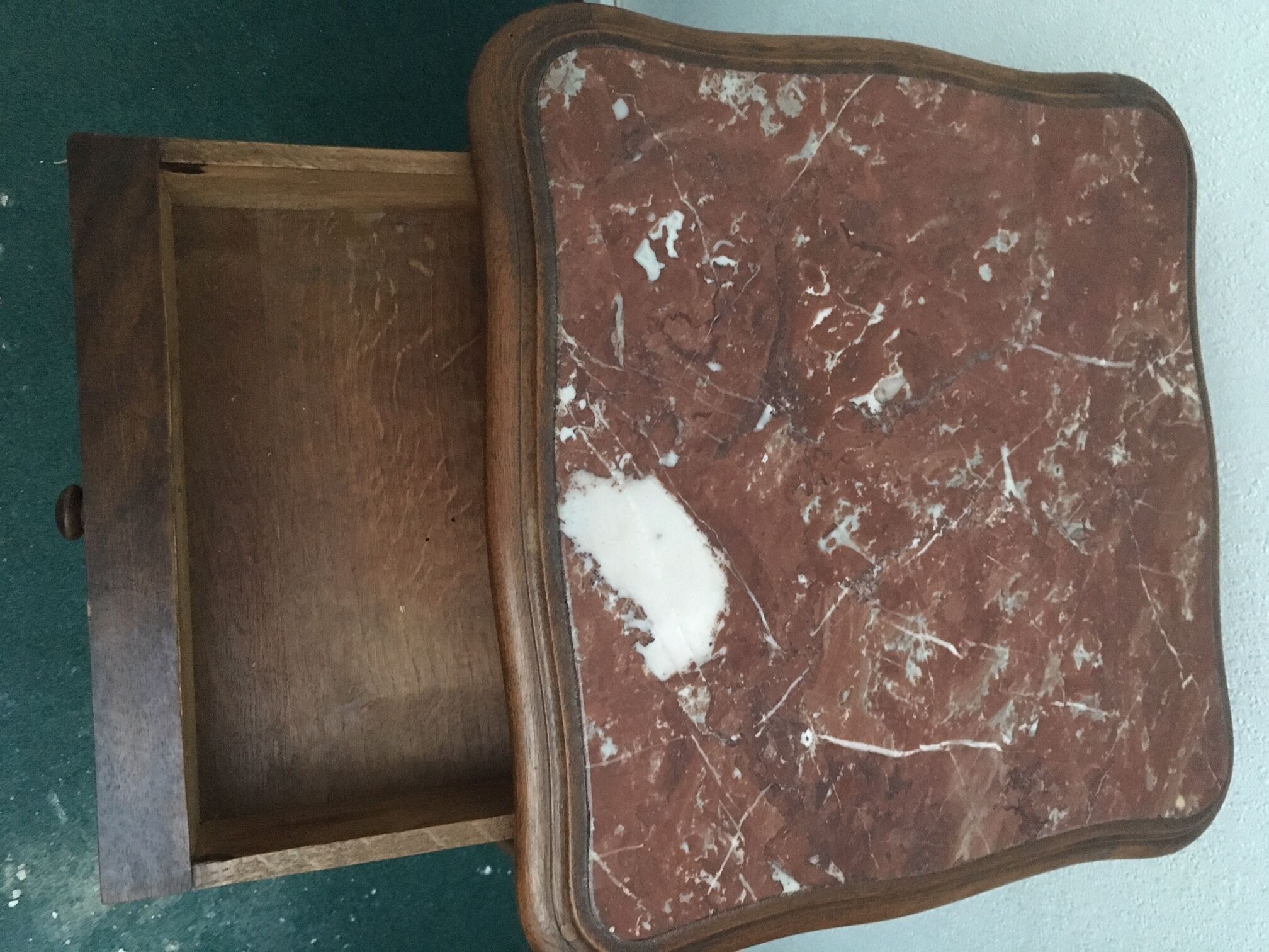 Louis Philippe beside table