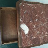 Louis Philippe beside table
