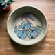 Ceramic salad bowl with plum décor