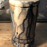 Enamelled pottery vase signed