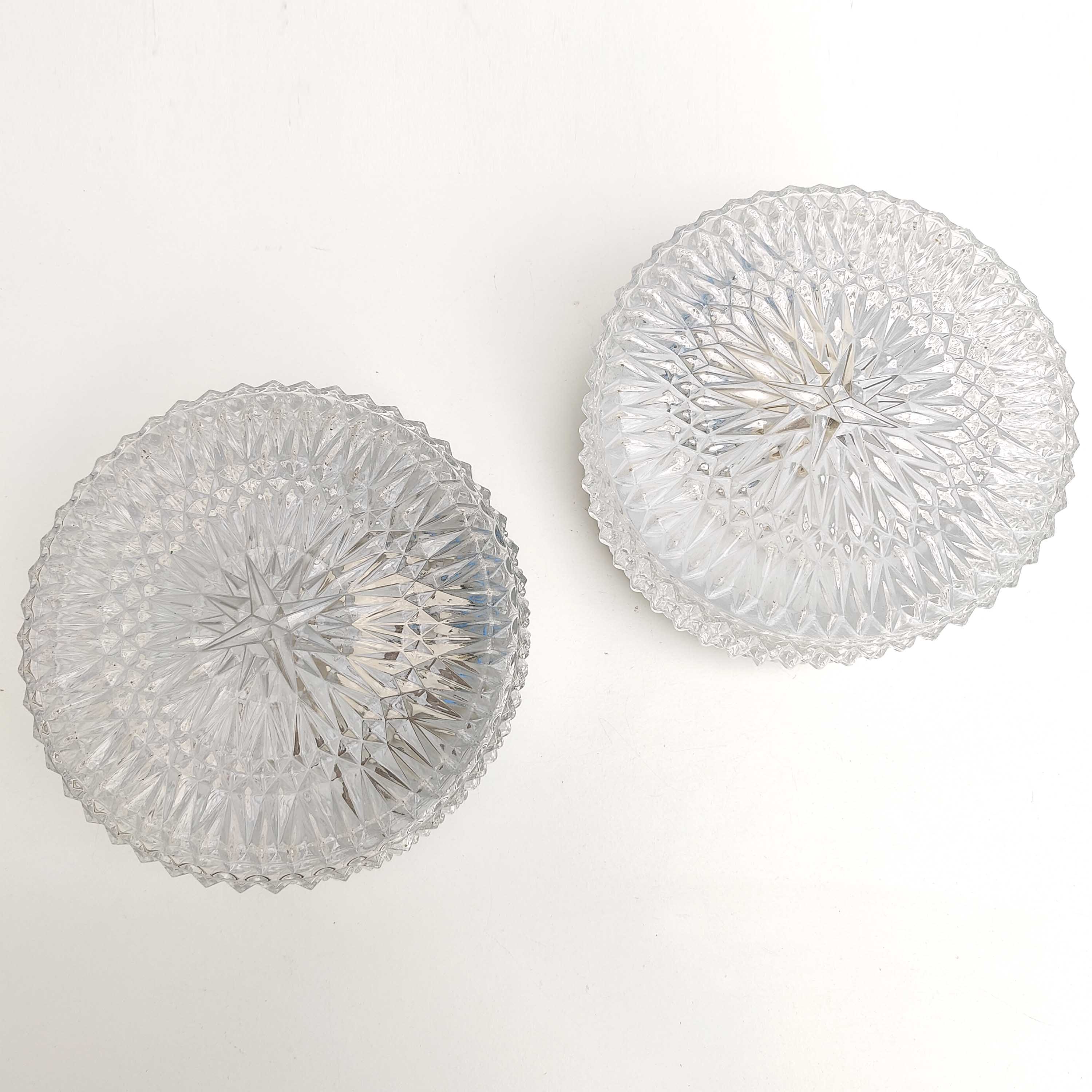 Pair of round ceiling lamps in molded glass relief