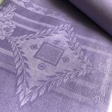 Old damask tablecloth in linen and purple silk