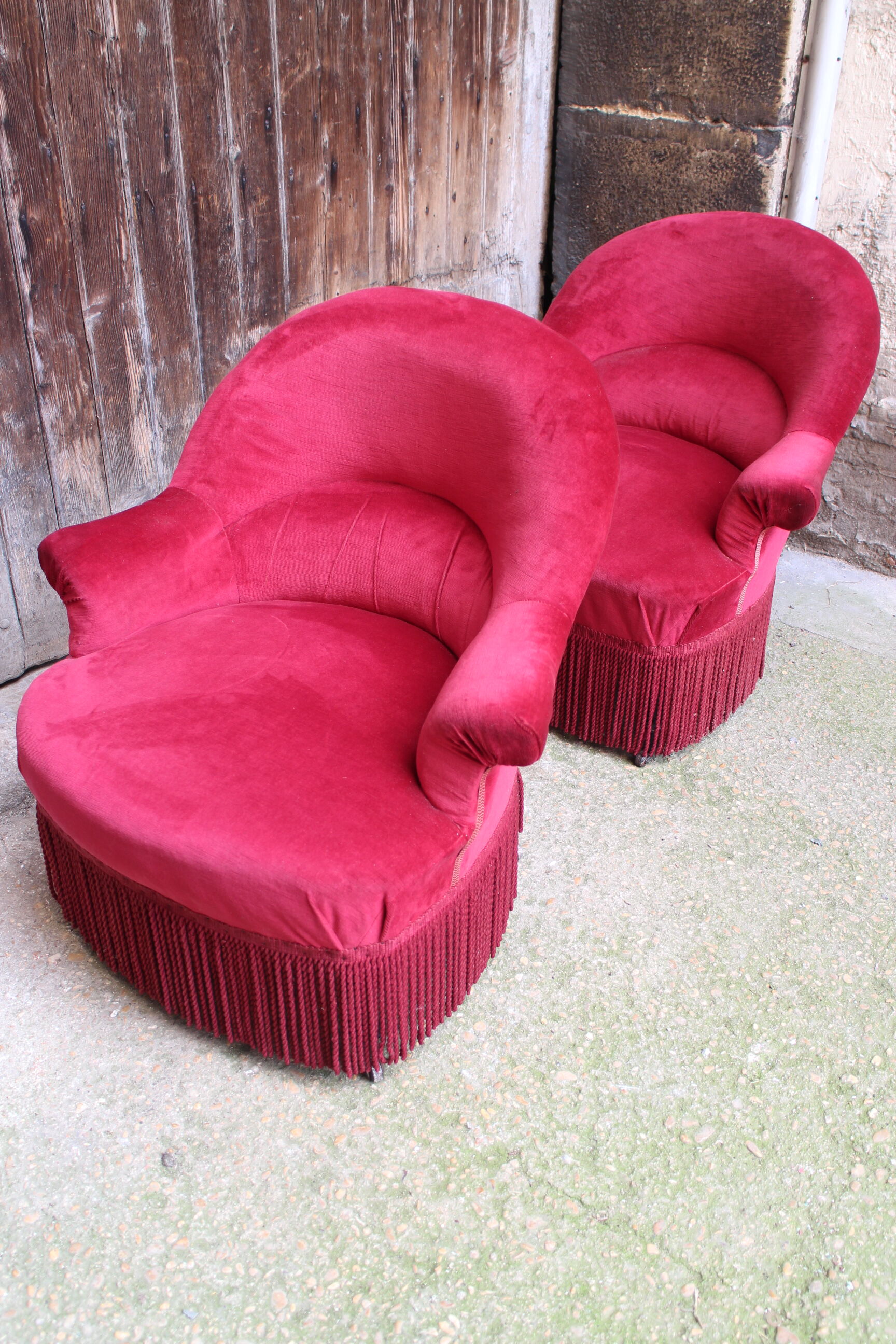 2 red velvet toad armchairs
