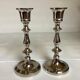 Pair of silver metal candlesticks