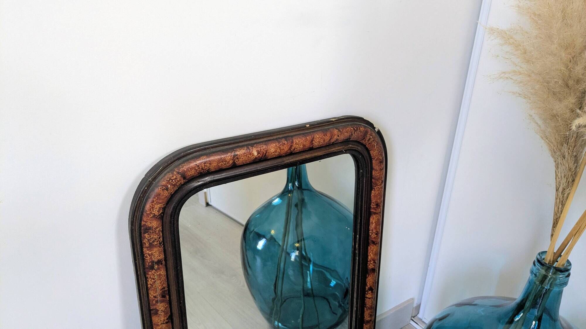 Antique Louis-Philippe mirror in blackened wood with a burl effect – 67x52 cm