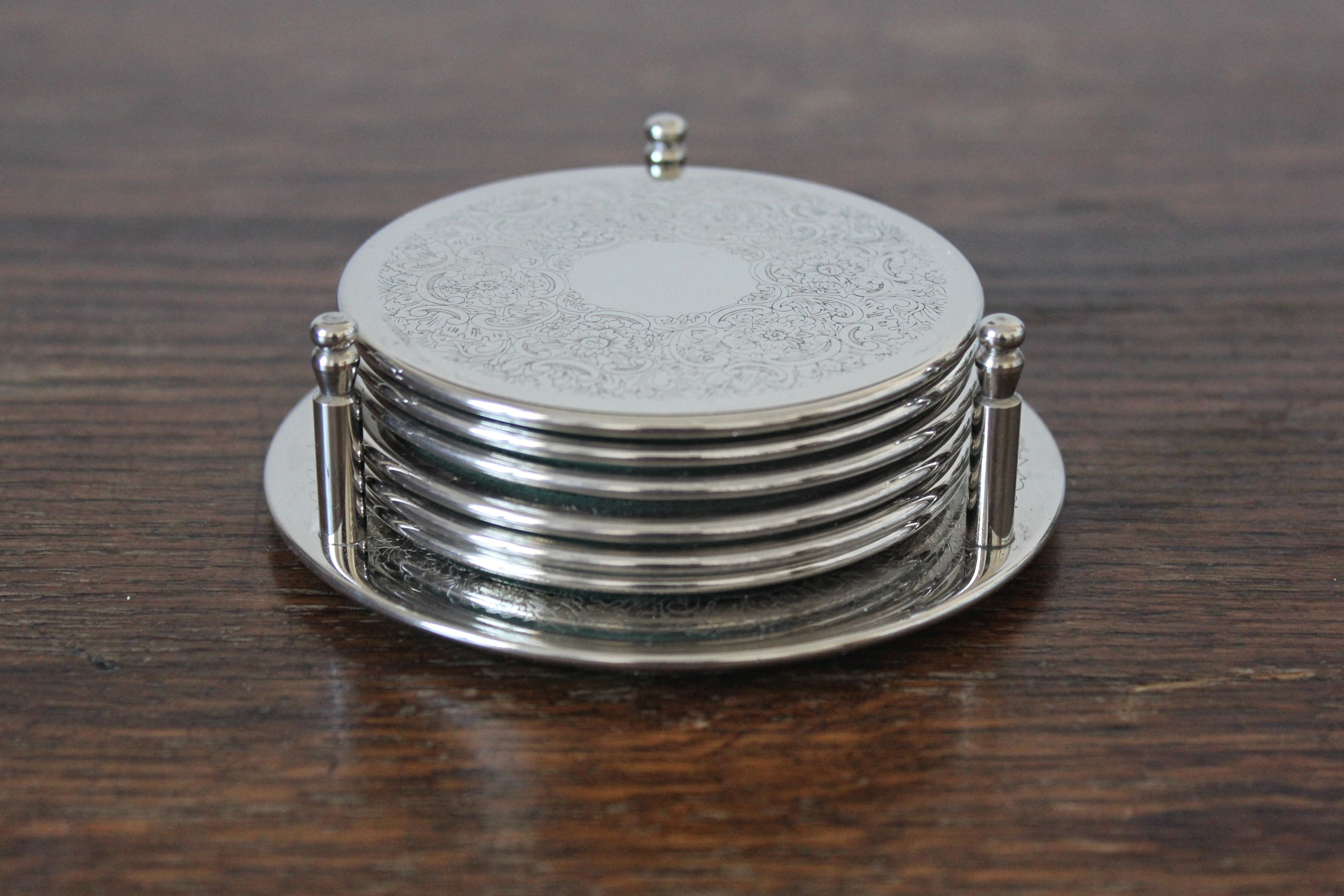 6 vintage chiseled silver metal coasters