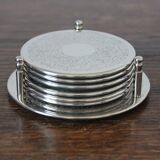 6 vintage chiseled silver metal coasters