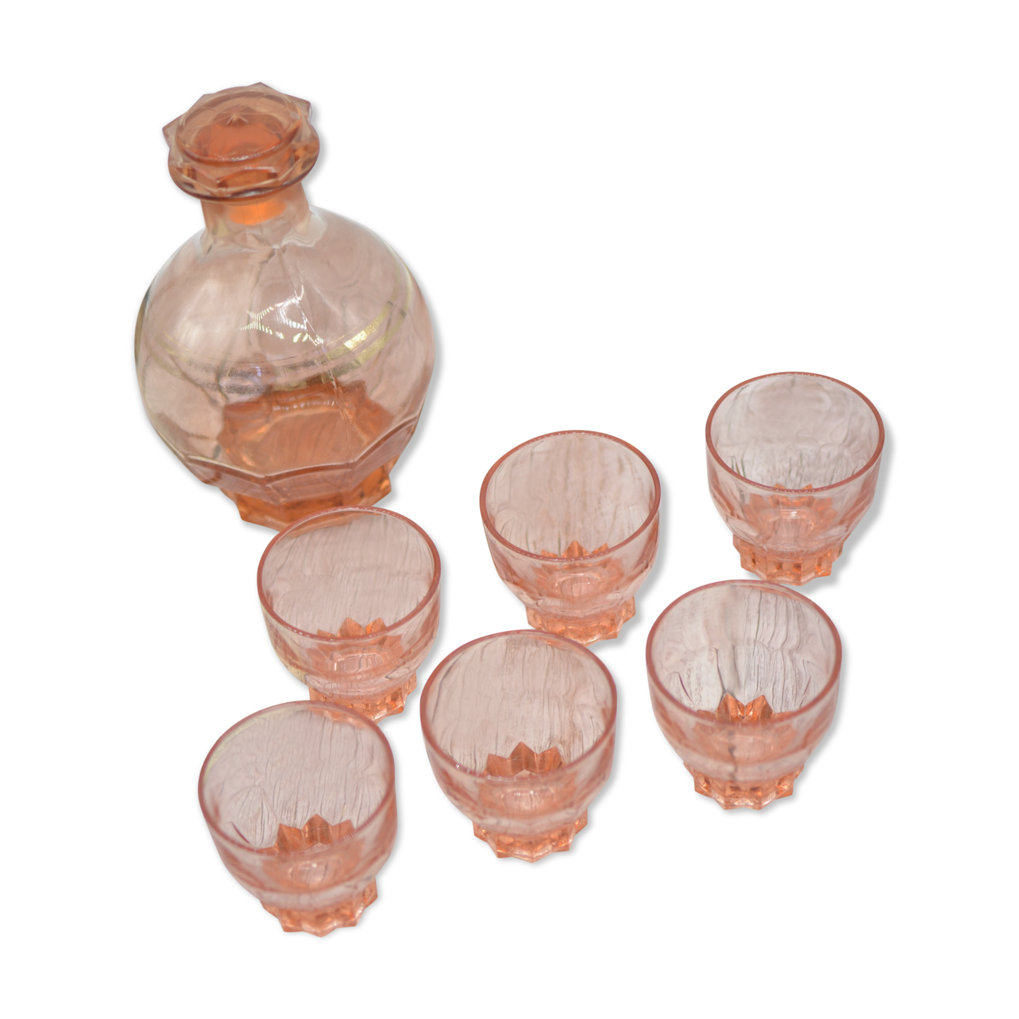 Vintage pink decanter with its 6 glasses