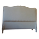 Louis XV style headboard with pearl grey patina, upholstered in off-white bouclette.