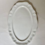 Shaped plates and dishes in Sarreguemines earthenware.