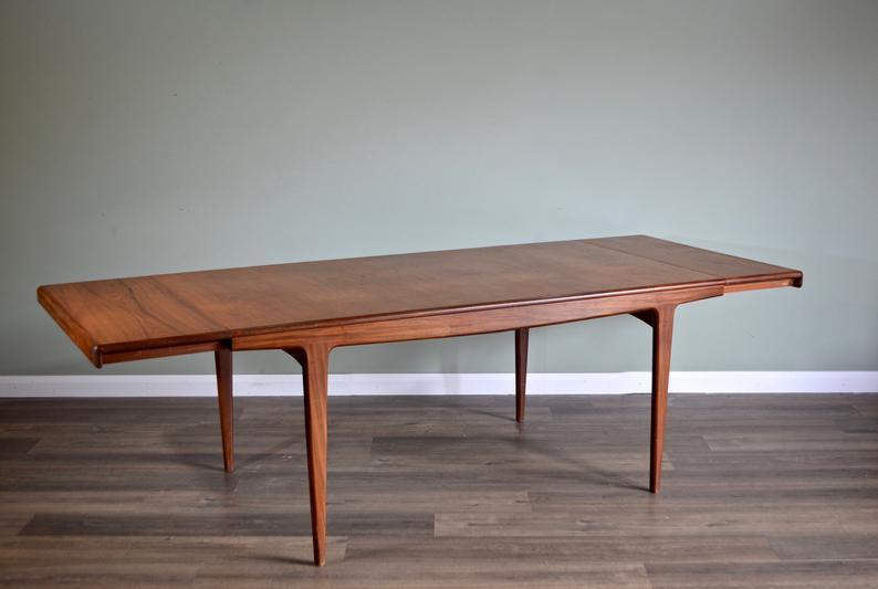 Extending teak table