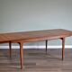 Extending teak table
