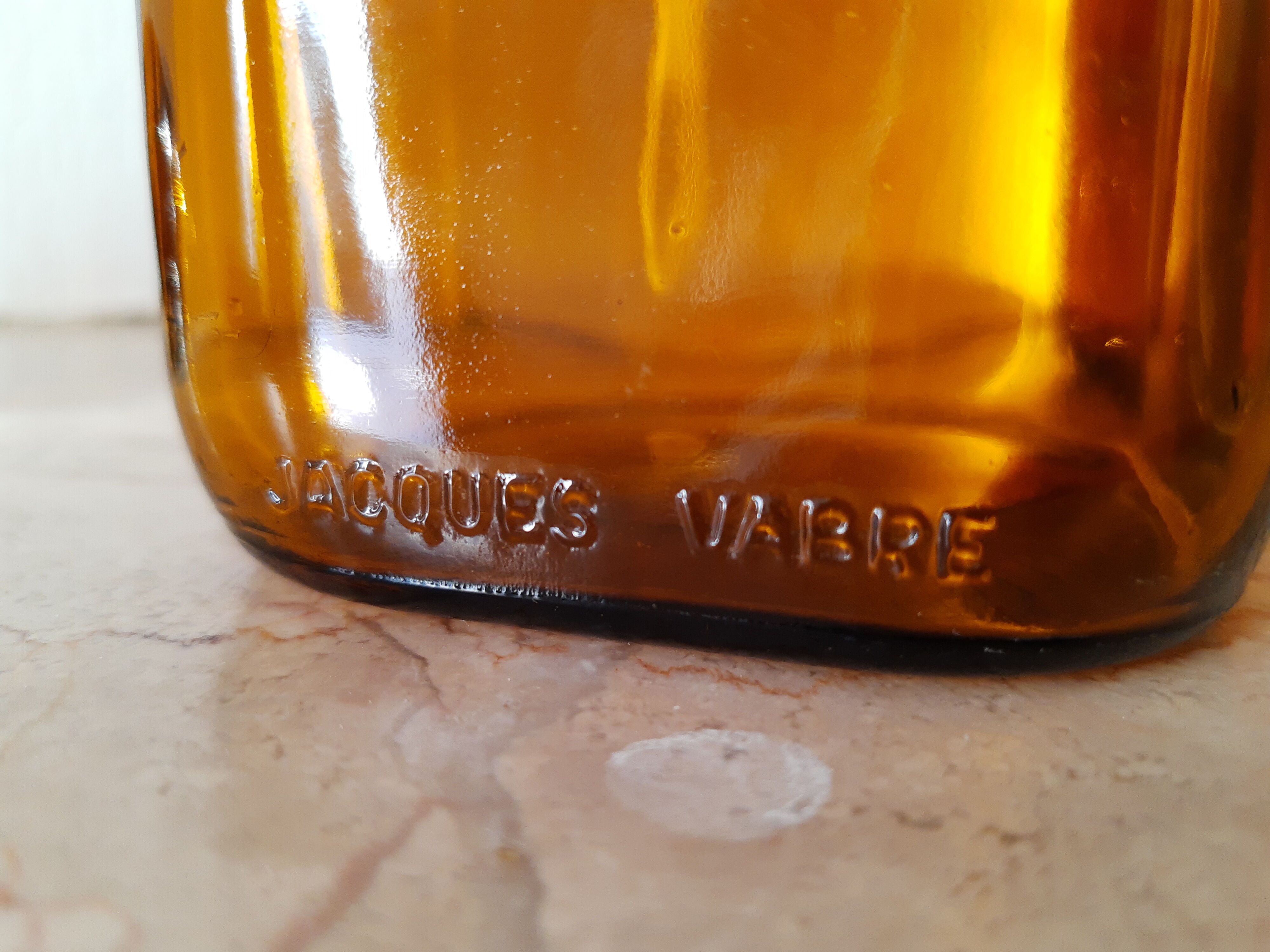 Pair of vintage amber glass jars