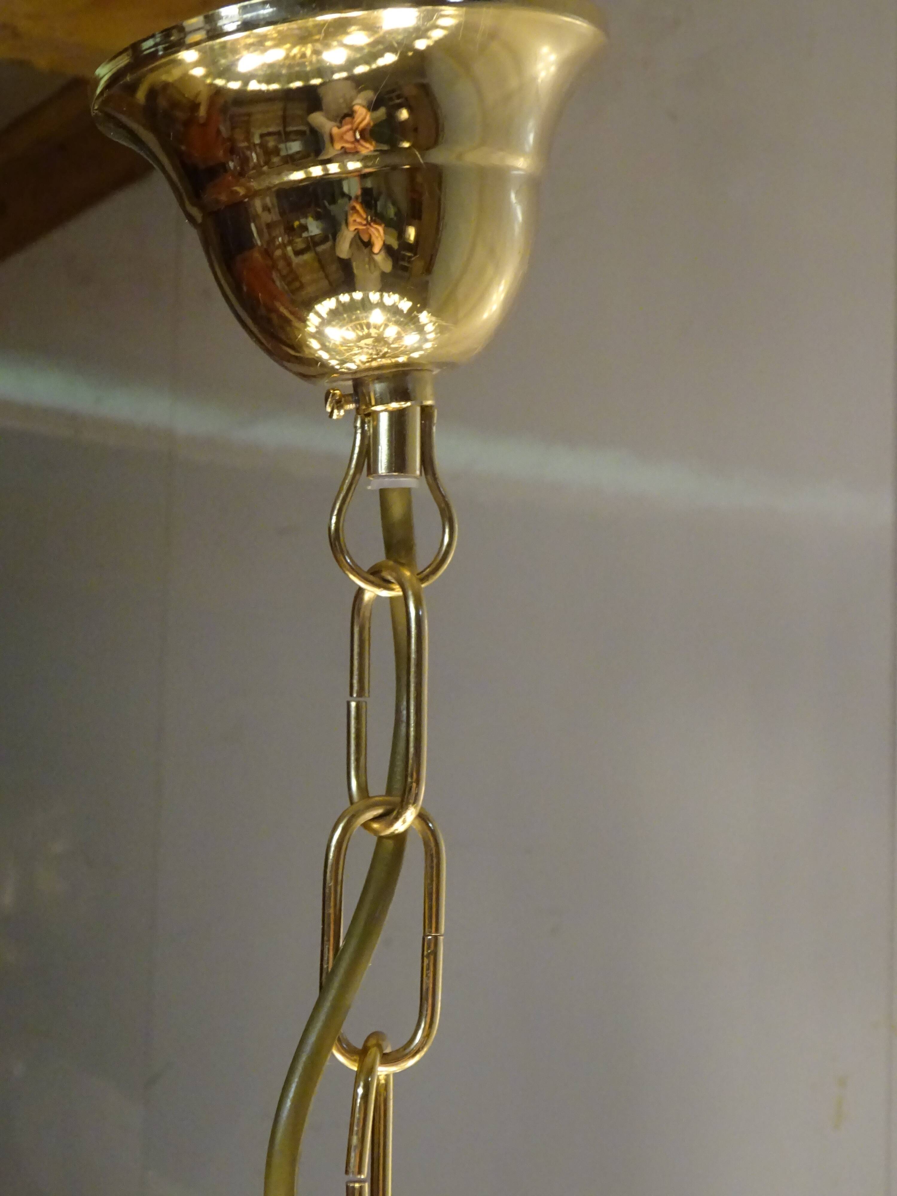 Brass chandelier and beveled glass, Italian manufacturing