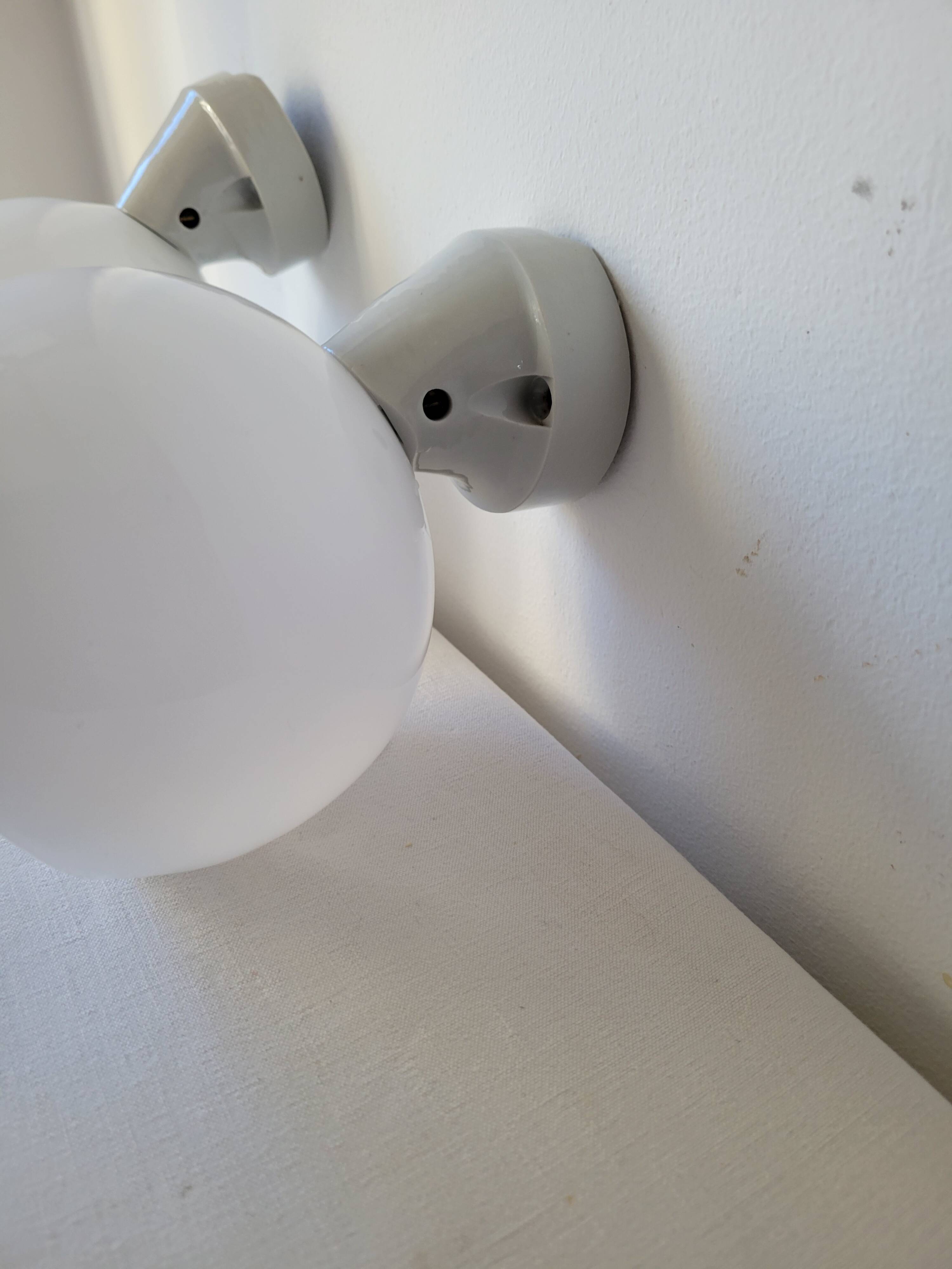 Duo of opaline and porcelain sconces