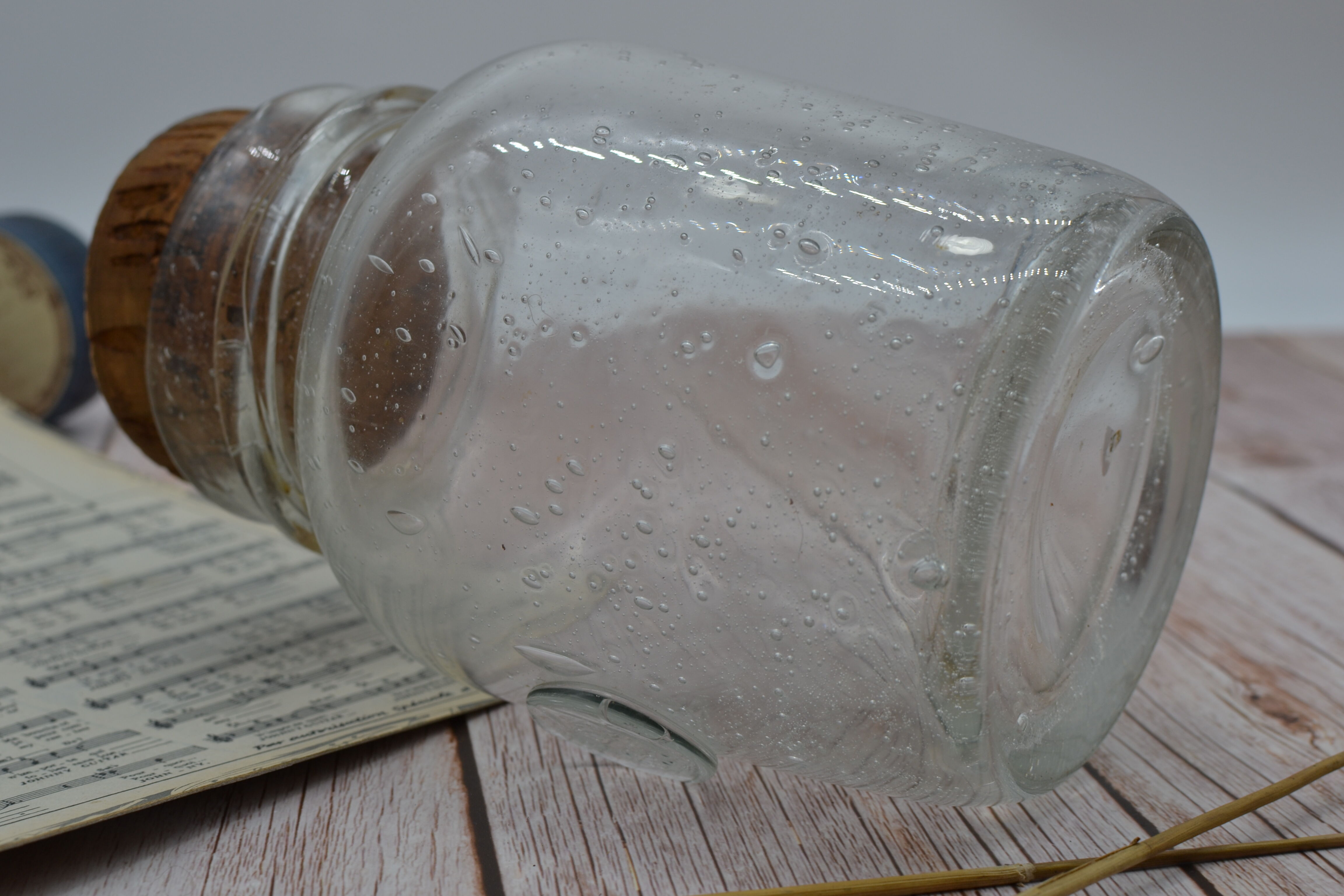 Blown glass jar with original cap