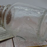 Blown glass jar with original cap