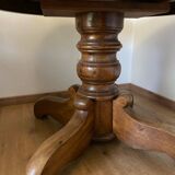 Round table in marble and walnut