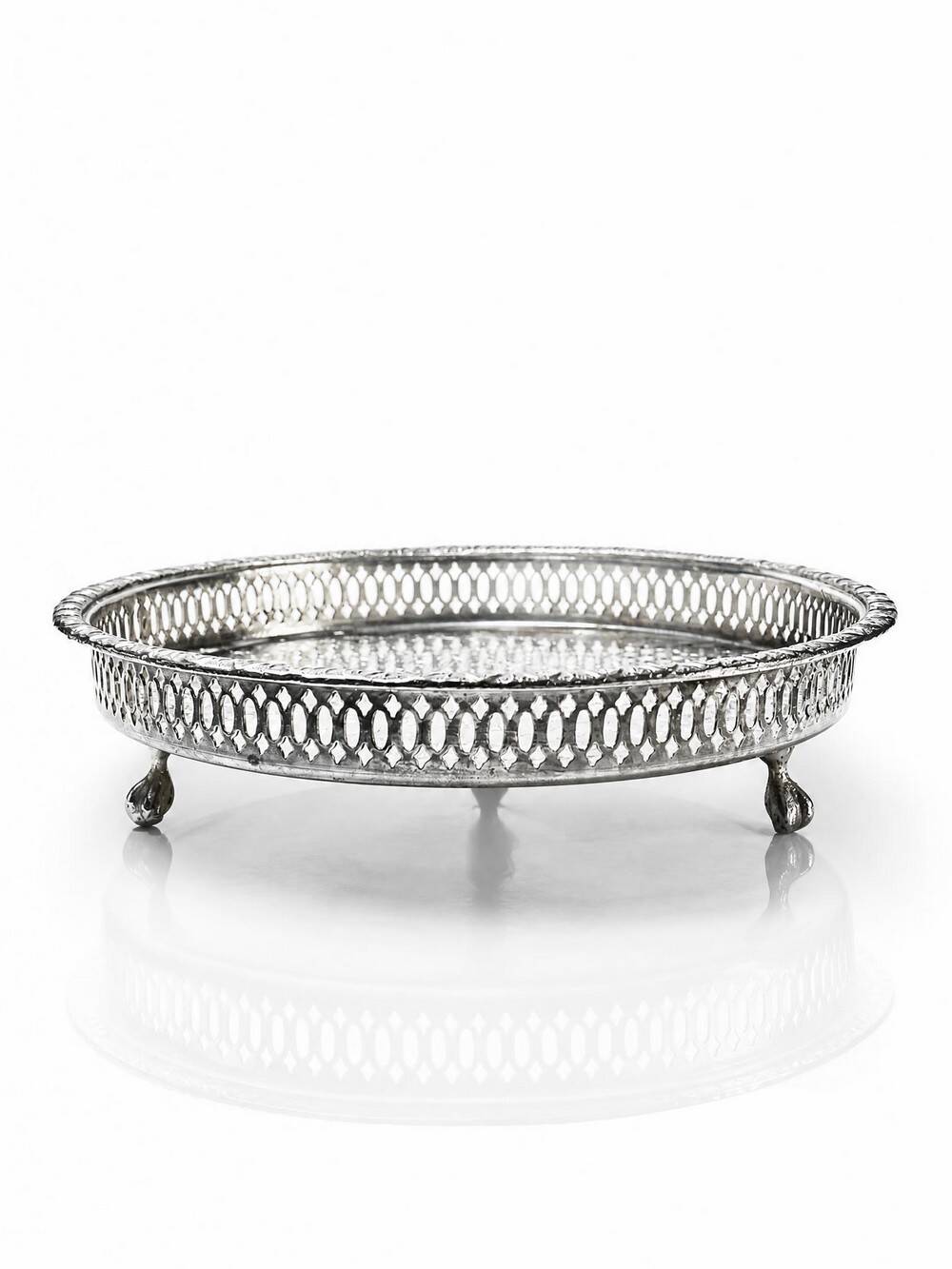 Small Moroccan tripod tea tray in silver-plated metal, vintage chiseled decoration.