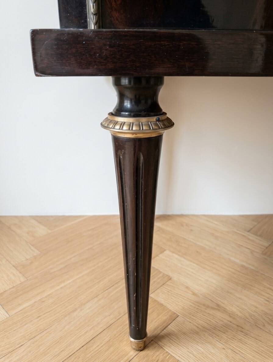 Pair of Louis XVI style bedside tables in dark wood.