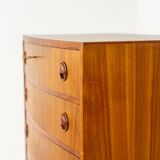 Commode à façade bombée Kai Kristiansen (Danemark, années 1960).