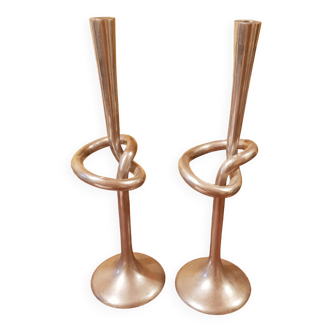 Pair of large cast aluminum candlesticks signed kare design.