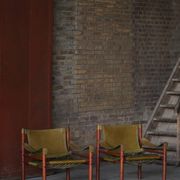 Arne Norell, Pair of "Sirocco" Safari armchairs in ash and green leather, 1960s.