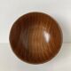 Japanese Showa bowl made of stained brown paulownia wood and carved.