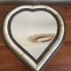 Heart-shaped bone and brass mirror