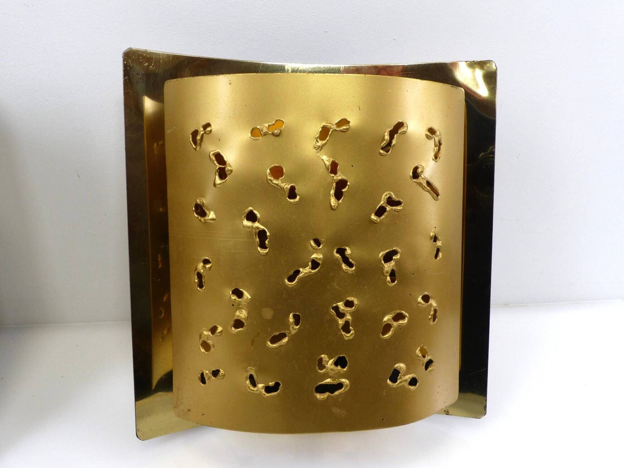 Pair of brutalist wall lights Boréns model 6477 in perforated brass – Sweden