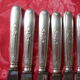 Series of 12 antique silver metal knives in their box