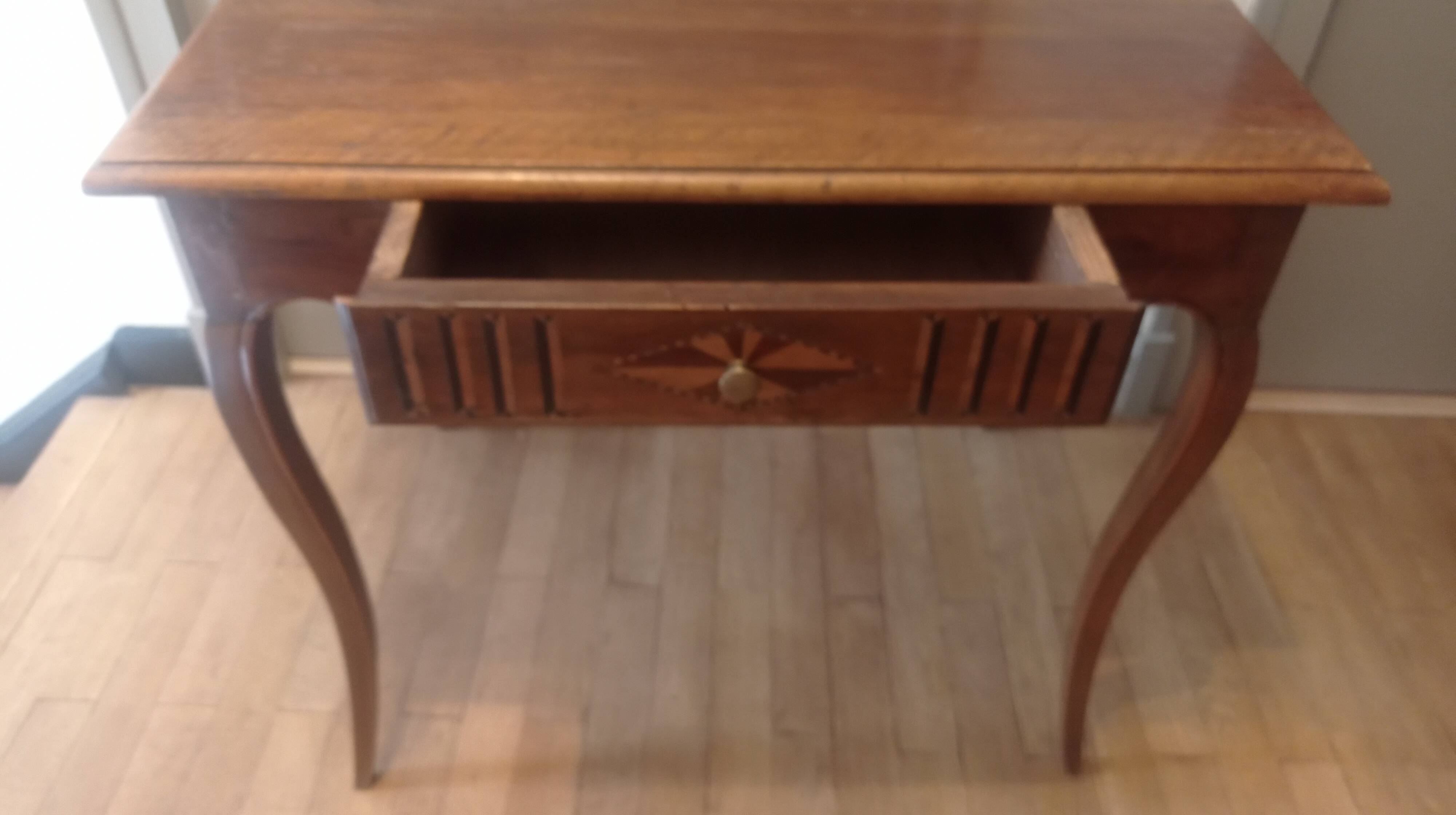 Walnut and marquetry table, 19th century.