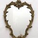Miroir classique rocaille en laiton doré vintage