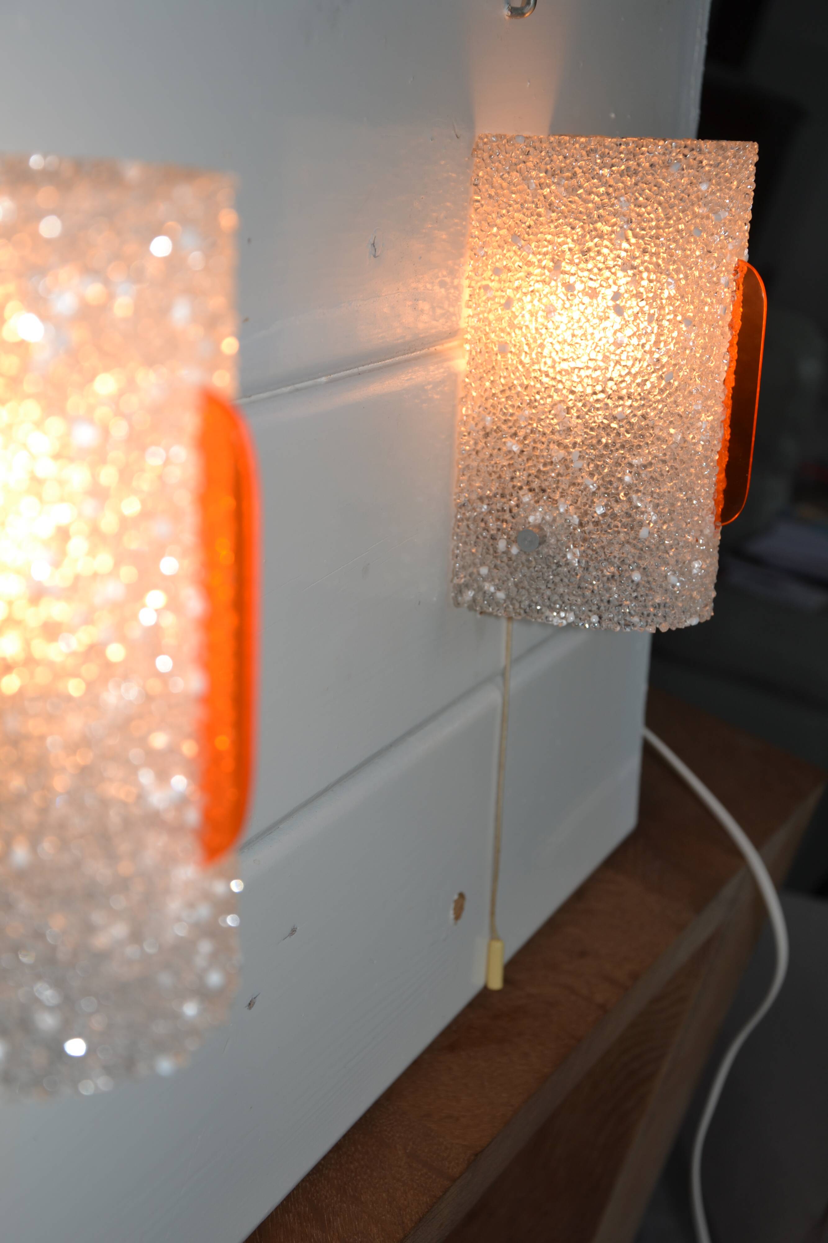 2 orange perspex and plexiglass wall lights from the 60s-70s.