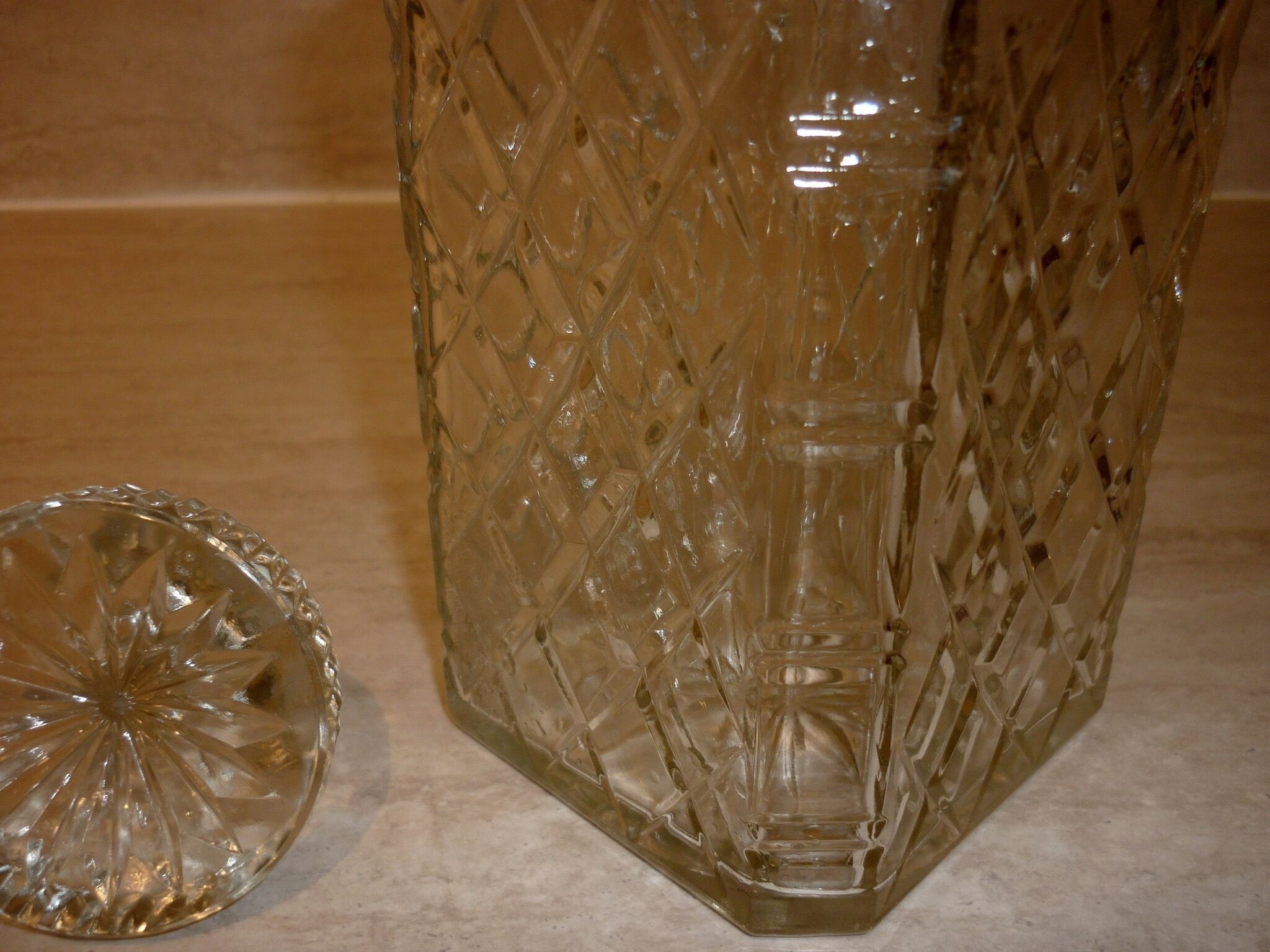 Antique whisky decanter made of chiseled glass