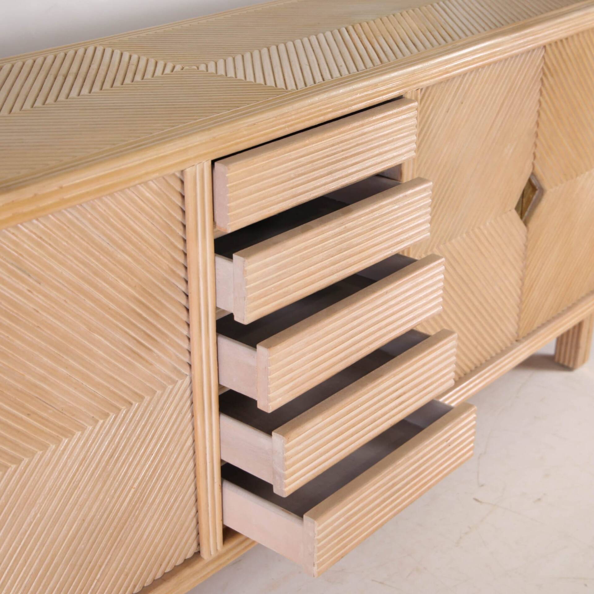 Rattan and brass sideboard