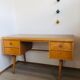60s office in honey wood and formica moka compass feet
