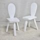 Pair of tripod chairs, gouged seats. Brutalist, circa 1960. Painted wood.