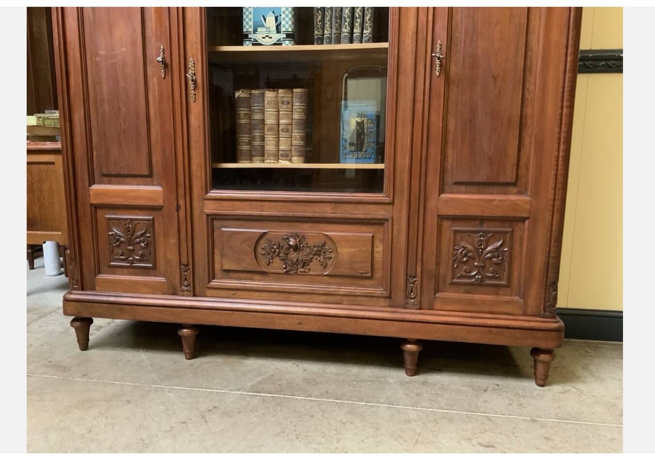 Antique Art Nouveau walnut bookcase