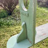 Old curved wooden farm bench
